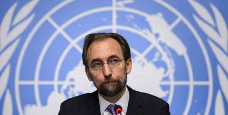 New High Commissioner of the United Nations (UN) for Human Rights, Zeid Ra'ad al-Hussein of Jordan (C) attends a press conference on October 16, 2014 in Geneva. AFP PHOTO / FABRICE COFFRINI